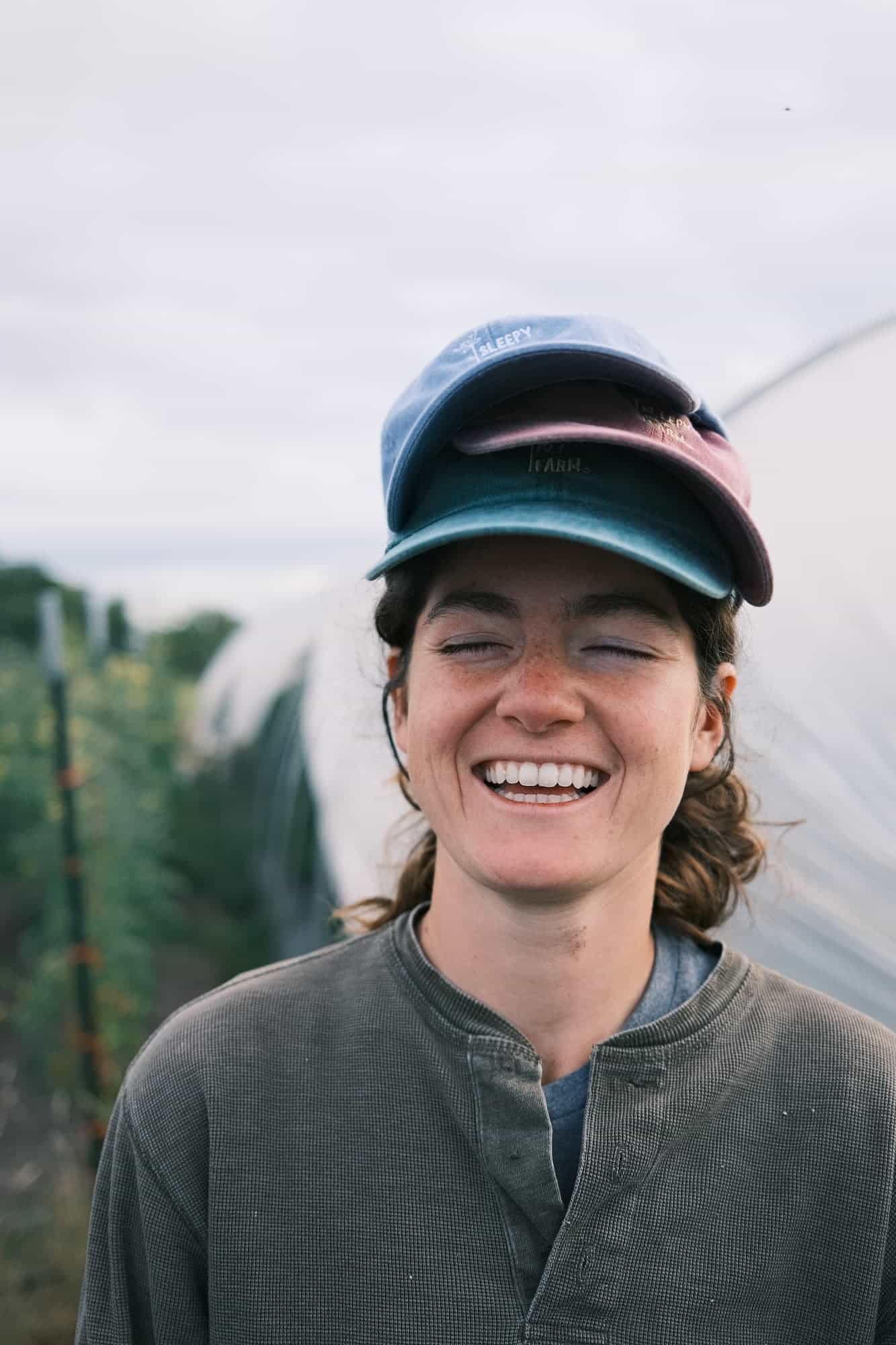 Sleepy Bee Farm hat on farm